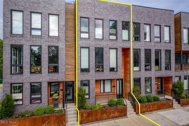 2317 Scranton Rd, Cleveland, OH 44113 - townhome / multi-family property featuring brick siding