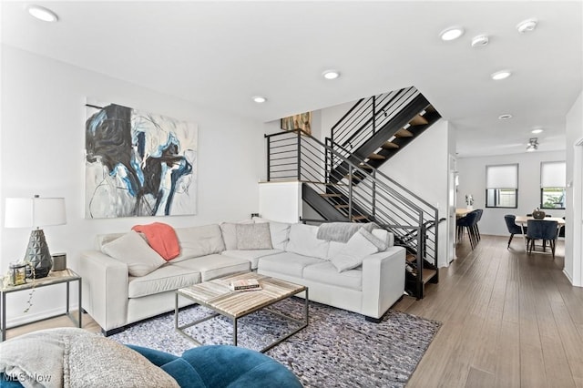 2317 Scranton Rd, Cleveland, OH 44113 - living area featuring stairs, wood finished floors, and recessed lighting