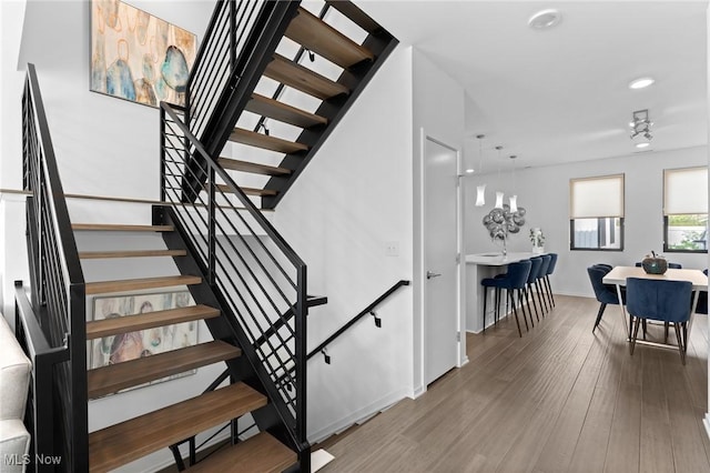 2317 Scranton Rd, Cleveland, OH 44113 - staircase featuring wood finished floors and recessed lighting