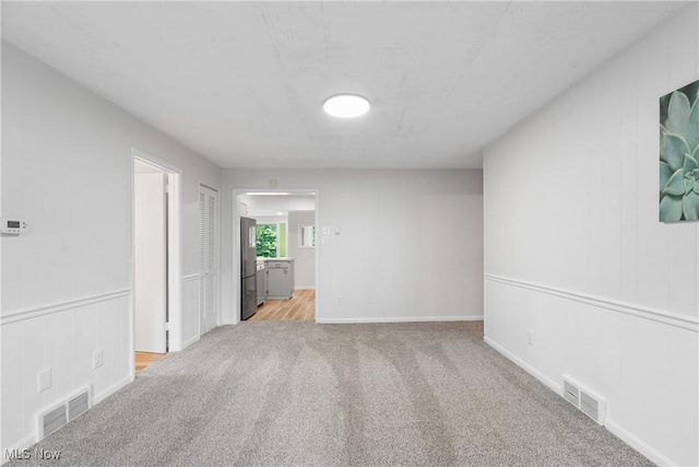164 Goodview Ave, Akron, OH 44305 - unfurnished room with light colored carpet
