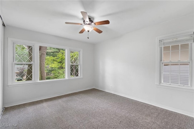 164 Goodview Ave, Akron, OH 44305 - carpeted empty room featuring ceiling fan and baseboards