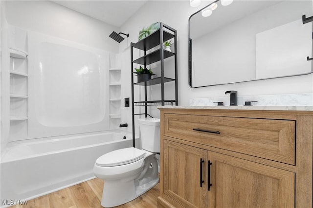 164 Goodview Ave, Akron, OH 44305 - bathroom featuring wood finished floors, vanity, and washtub / shower combination