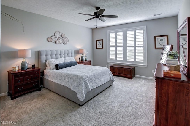 23797 St Andrews Dr, Columbia Station, OH 44028 - bedroom featuring light carpet, a textured ceiling, and a ceiling fan