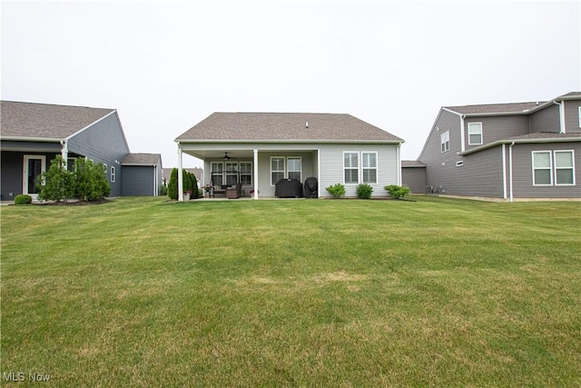 23797 St Andrews Dr, Columbia Station, OH 44028 - back of house featuring a yard, ceiling fan, and a patio