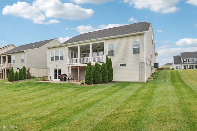 8488 Raya Ln, Streetsboro, OH 44241 - rear view of house with a patio, a lawn, and french doors