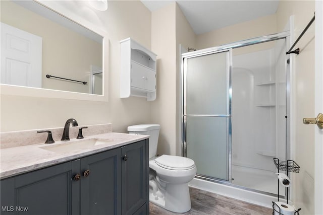 23004 Chandlers Ln Unit 107, Olmsted Falls, OH 44138 - full bath featuring wood finished floors, vanity, and a stall shower