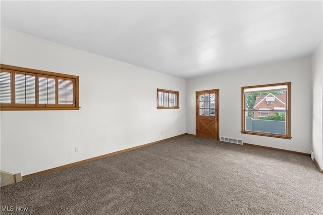 10808 Park Heights Ave, Garfield Heights, OH 44125 - empty room with carpet and baseboards