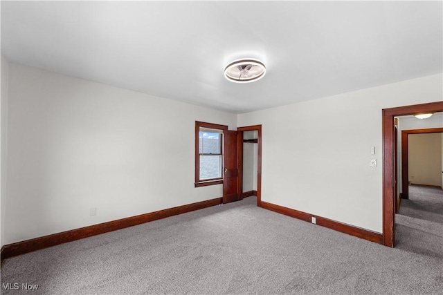 10808 Park Heights Ave, Garfield Heights, OH 44125 - carpeted empty room featuring baseboards