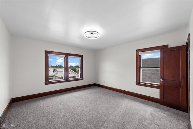 10808 Park Heights Ave, Garfield Heights, OH 44125 - carpeted spare room featuring healthy amount of natural light