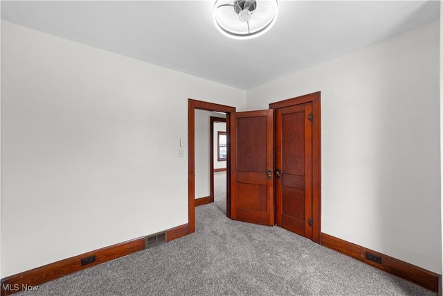 10808 Park Heights Ave, Garfield Heights, OH 44125 - carpeted empty room with baseboards