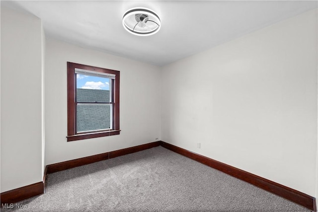 10808 Park Heights Ave, Garfield Heights, OH 44125 - unfurnished room featuring baseboards and carpet flooring