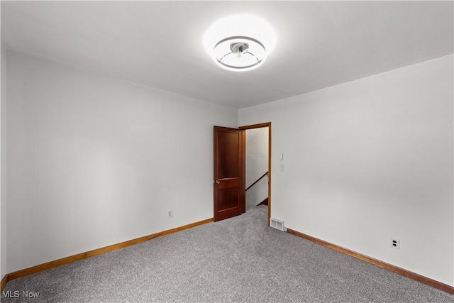 10808 Park Heights Ave, Garfield Heights, OH 44125 - carpeted spare room with baseboards