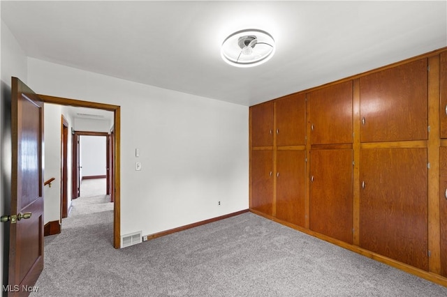 10808 Park Heights Ave, Garfield Heights, OH 44125 - unfurnished bedroom with carpet flooring and a closet