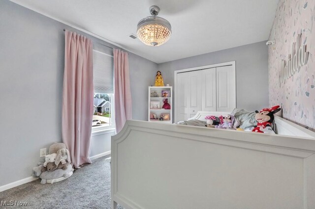 13196 Barrington Dr, Grafton, OH 44044 - carpeted bedroom with baseboards and a closet