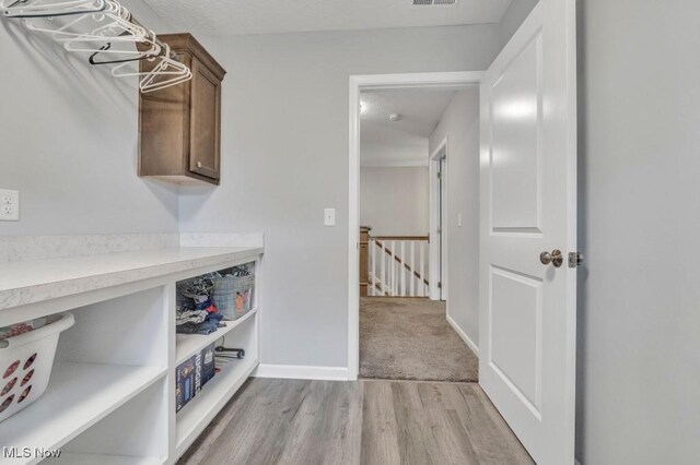 13196 Barrington Dr, Grafton, OH 44044 - spacious closet featuring light wood-type flooring