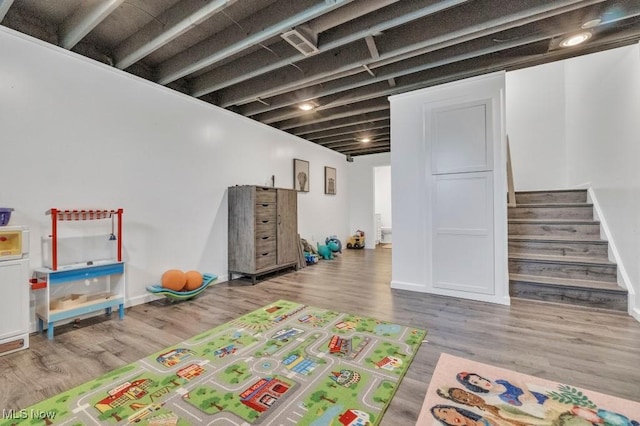 13196 Barrington Dr, Grafton, OH 44044 - recreation room with wood finished floors and baseboards