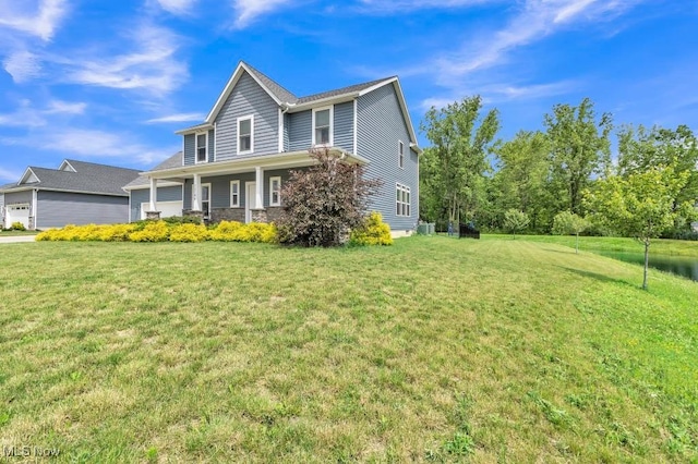 13196 Barrington Dr, Grafton, OH 44044 - view of front facade with a front lawn and a garage