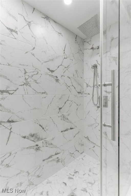 381 Lauretta Ln, Hubbard, OH 44425 - bathroom featuring a marble finish shower