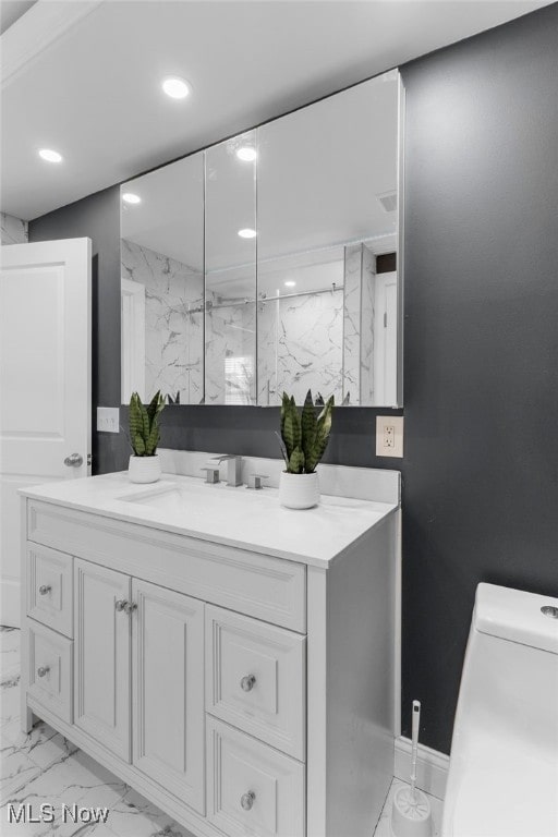 381 Lauretta Ln, Hubbard, OH 44425 - full bathroom with marble look tiles, vanity, and recessed lighting