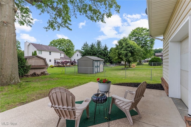 381 Lauretta Ln, Hubbard, OH 44425 - fenced backyard with a patio area and a shed