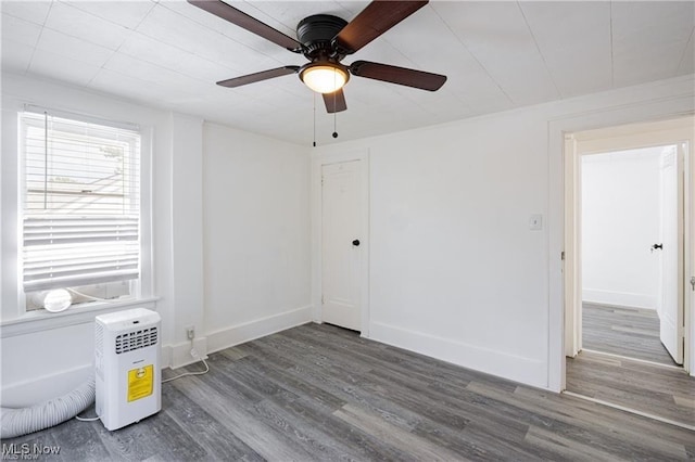 1145 Herberich Ave, Akron, OH 44301 - unfurnished room with wood finished floors and a ceiling fan
