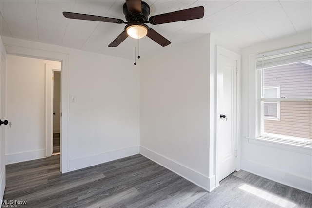 1145 Herberich Ave, Akron, OH 44301 - empty room with dark wood finished floors and ceiling fan