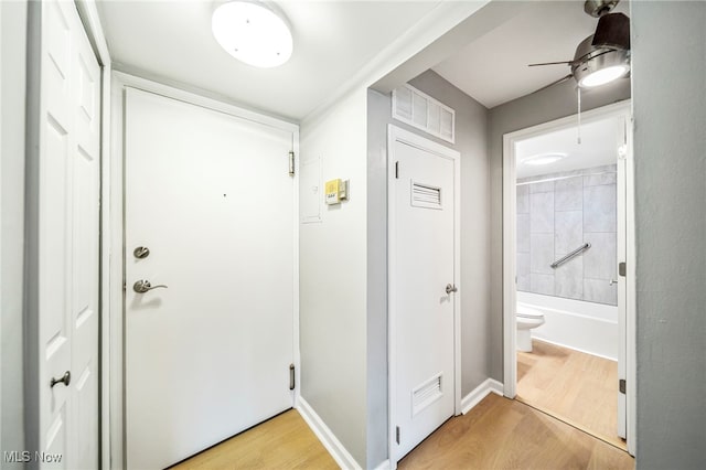 1372 Golden Gate Blvd, Mayfield Heights, OH 44124 - entrance foyer featuring light wood finished floors and a ceiling fan
