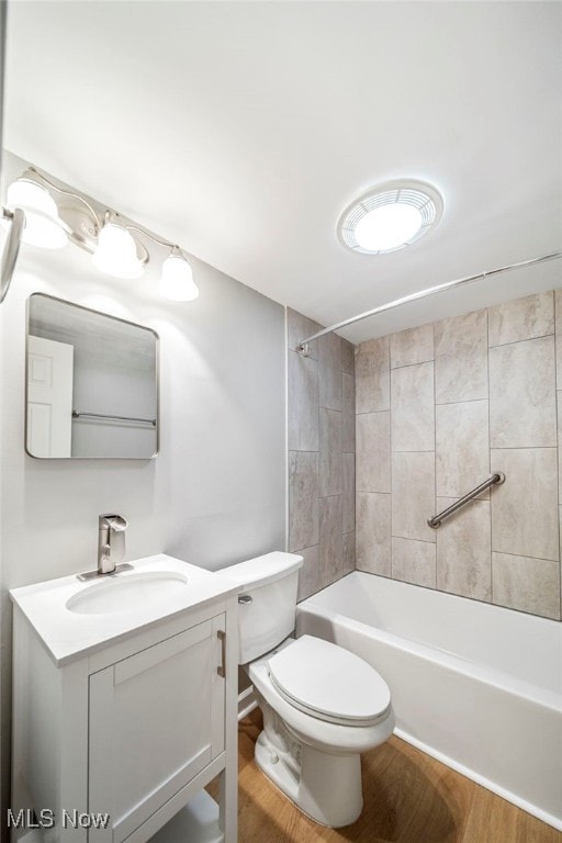 1372 Golden Gate Blvd, Mayfield Heights, OH 44124 - full bathroom with vanity, bathing tub / shower combination, and wood finished floors