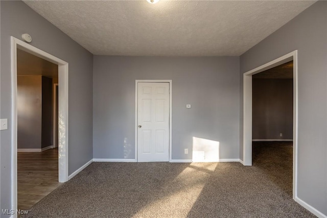 3888 W 37th St, Cleveland, OH 44109 - carpeted spare room featuring a textured ceiling and a smoke detector