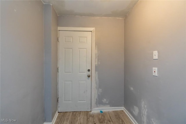 3888 W 37th St, Cleveland, OH 44109 - washroom with wood finished floors and baseboards
