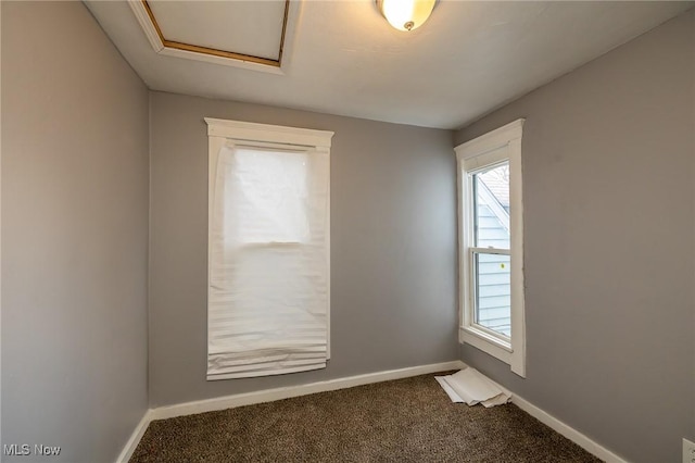 3888 W 37th St, Cleveland, OH 44109 - unfurnished room featuring healthy amount of natural light, attic access, and carpet