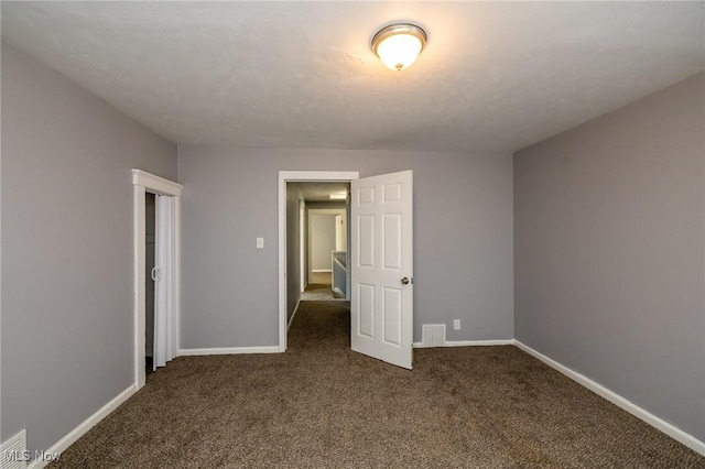 3888 W 37th St, Cleveland, OH 44109 - spare room with dark carpet