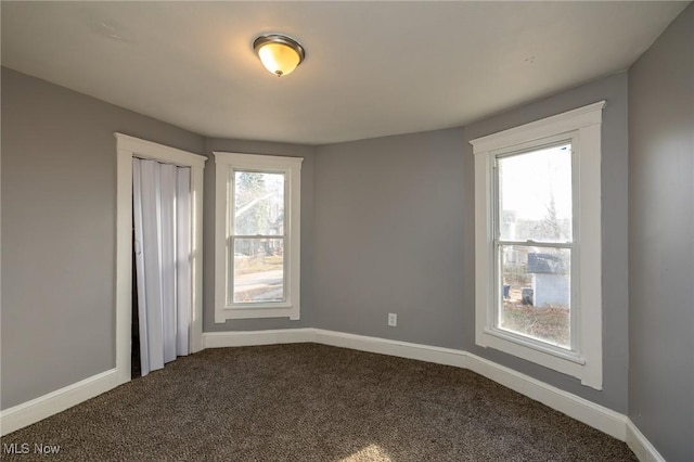 3888 W 37th St, Cleveland, OH 44109 - spare room featuring dark colored carpet