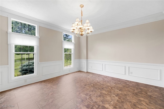 4035 Evergreen Ln, Richfield, OH 44286 - spare room featuring plenty of natural light, a chandelier, ornamental molding, and a wainscoted wall