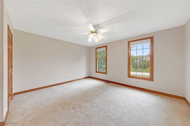 4035 Evergreen Ln, Richfield, OH 44286 - unfurnished room with light carpet and a ceiling fan