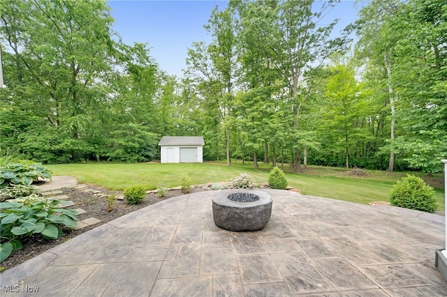 4035 Evergreen Ln, Richfield, OH 44286 - view of patio / terrace with an outdoor fire pit and an outbuilding