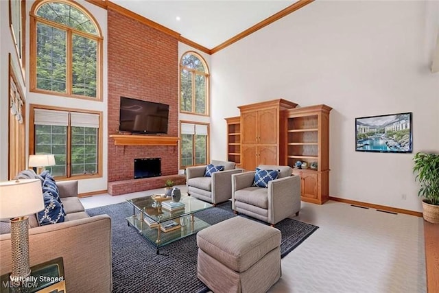 4035 Evergreen Ln, Richfield, OH 44286 - living area featuring a towering ceiling, crown molding, and a brick fireplace