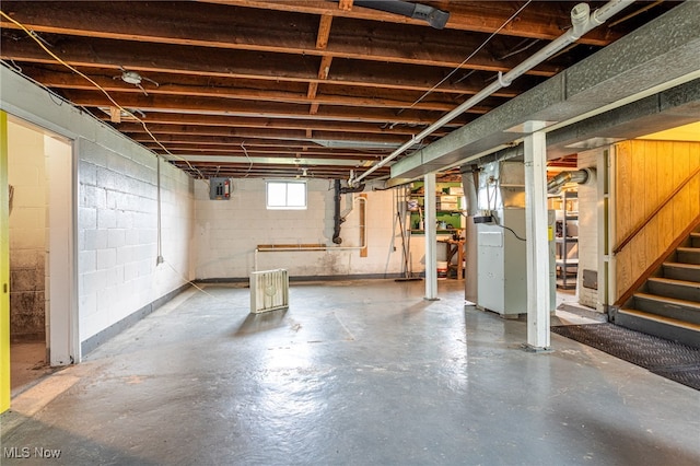 15459 Serfass Rd, Doylestown, OH 44230 - basement featuring stairs, heating unit, and electric panel