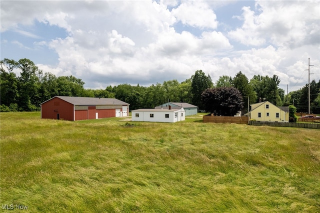 15459 Serfass Rd, Doylestown, OH 44230 - view of yard featuring a detached garage, a pole building, and an outdoor structure