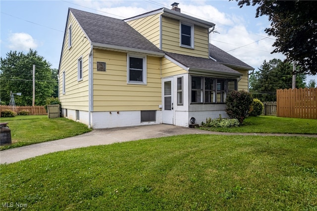 15459 Serfass Rd, Doylestown, OH 44230 - view of front of property featuring a shingled roof, a chimney, and a patio
