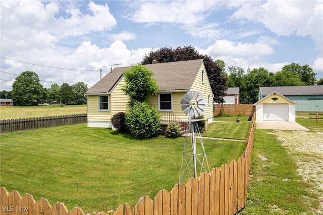 15459 Serfass Rd, Doylestown, OH 44230 - view of home's exterior featuring driveway, a fenced backyard, a garage, and roof with shingles