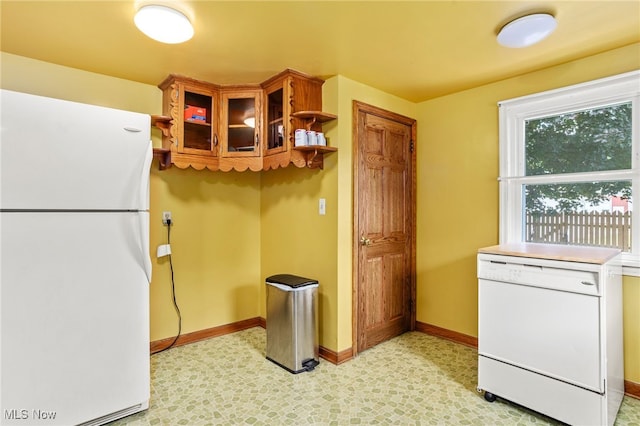 15459 Serfass Rd, Doylestown, OH 44230 - kitchen featuring white appliances and baseboards