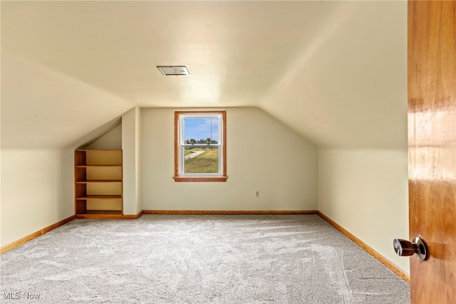 15459 Serfass Rd, Doylestown, OH 44230 - additional living space with carpet flooring and vaulted ceiling