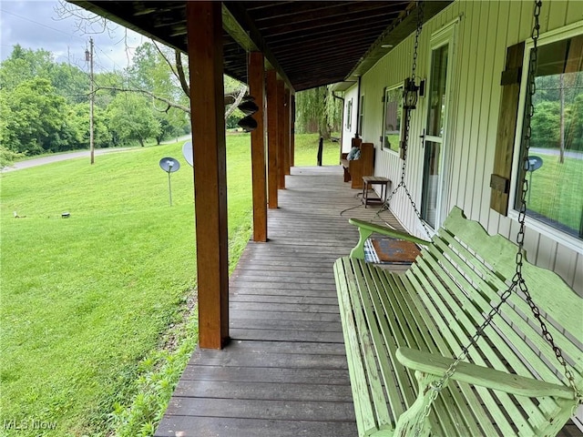 1550 Swift Rd, Waterford, OH 45786 - wooden porch with a yard
