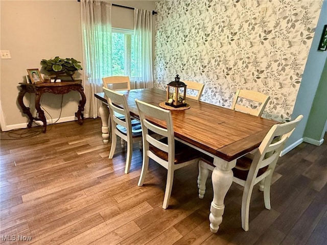 1550 Swift Rd, Waterford, OH 45786 - dining space featuring wood finished floors and wallpapered walls