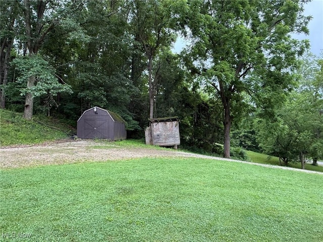 1550 Swift Rd, Waterford, OH 45786 - view of green lawn featuring a storage shed