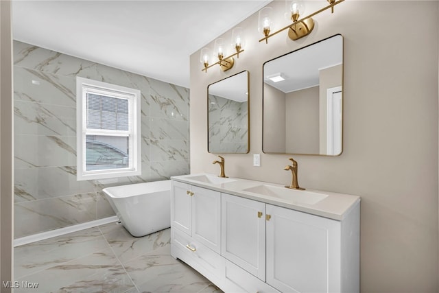 7569 Lake Shore Blvd, Madison, OH 44057 - bathroom featuring double vanity, a freestanding bath, marble look tiles, and tile walls
