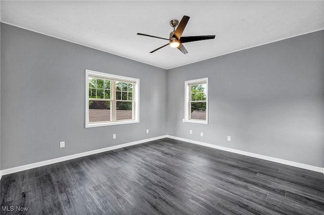 7569 Lake Shore Blvd, Madison, OH 44057 - unfurnished room with dark wood-type flooring and ceiling fan