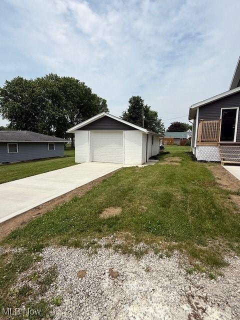 637 Maple St, Newcomerstown, OH 43832 - detached garage with concrete driveway