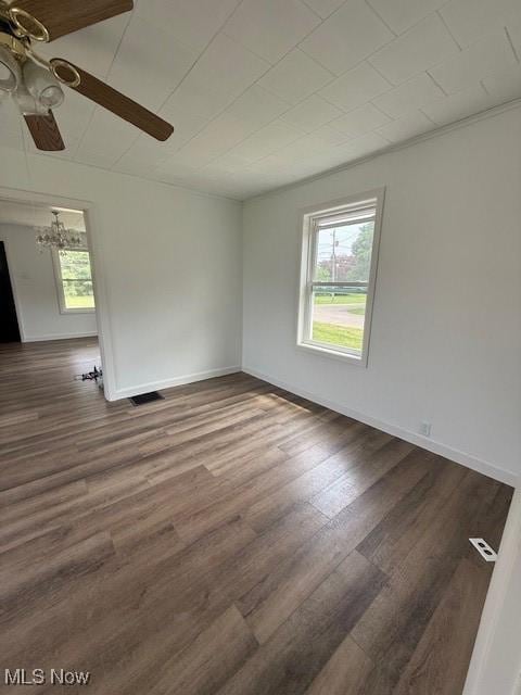 637 Maple St, Newcomerstown, OH 43832 - spare room featuring ceiling fan and wood finished floors